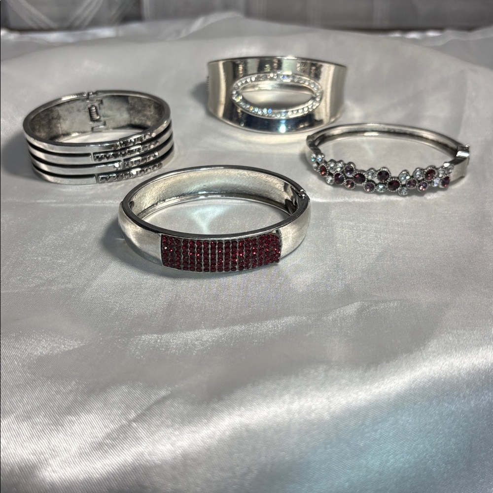 Paparazzi set of 4 Elegant Silver bracelets with bling. All 4 go for one price